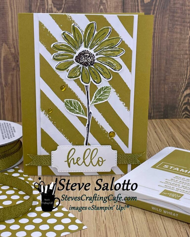 A greeting card with a yellow daisy on it that says "hello"