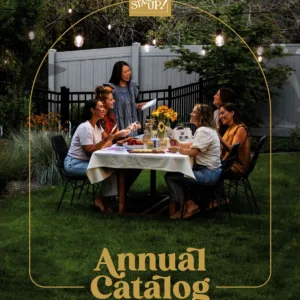 Women sit in a garden with smiles on their faces. Text reads, "Stampin' Up! Annual Catalog May 2024 - April 2025"