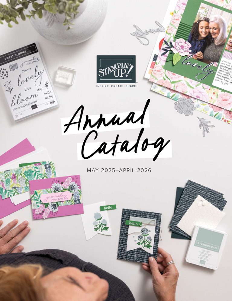 Various cards and card making supplies lie on a white craft table, surrounding the words, "Stampin' Up! Annual Catalog May 2025 - April 2026"