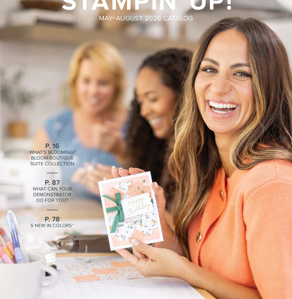 A smiling woman holds up a handmade card under text that reads, "Stampin' Up! May - August 2026 Catalog"