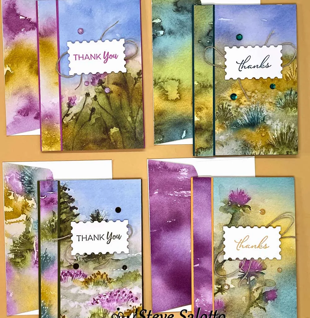 Four thank you cards with landscape paintings on them.