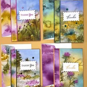 Four thank you cards with landscape paintings on them.