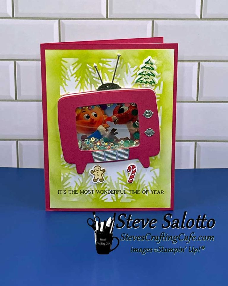 A Christmas card with a die cut television on the front showing Rudolph the red nose reindeer and a sentiment under it that reads, “it's the most wonderful time of year."