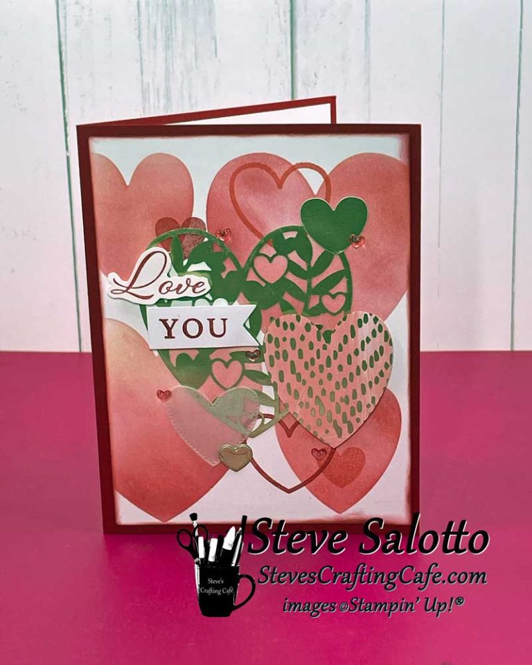 A red, pink, and gold Valentine's Day card with various hearts on it and a sentiment that reads "Love You."