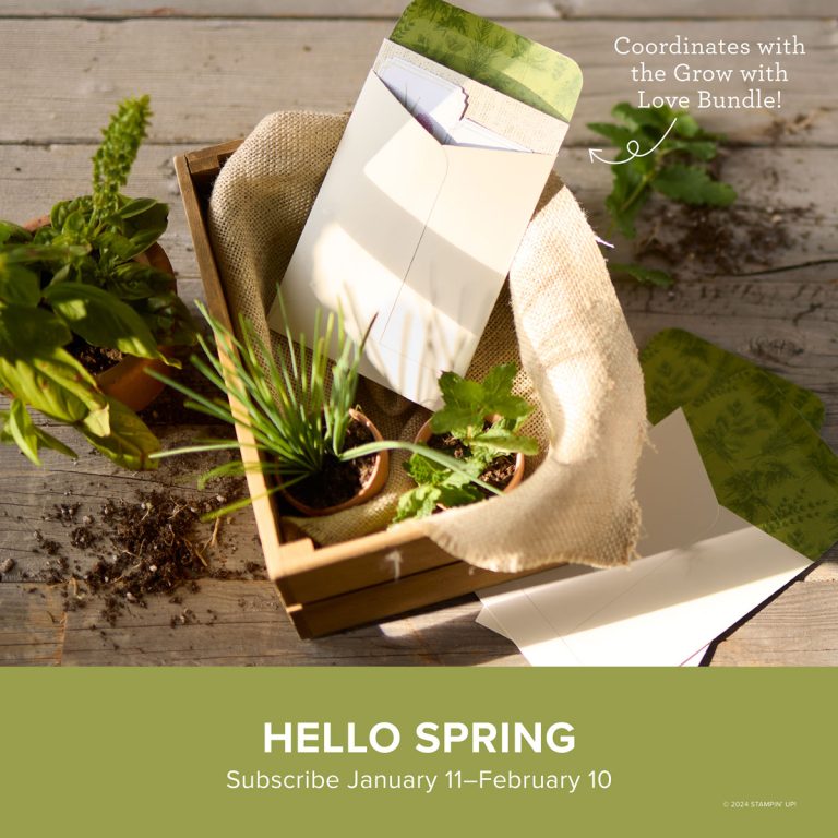 An envelope sits among plants in a basket. Below is written, "Hello Spring."