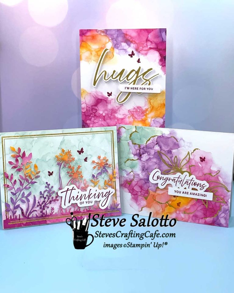 Three greeting cards in pinks and oranges with sentiments such as "Hugs" and "Thinking of You."