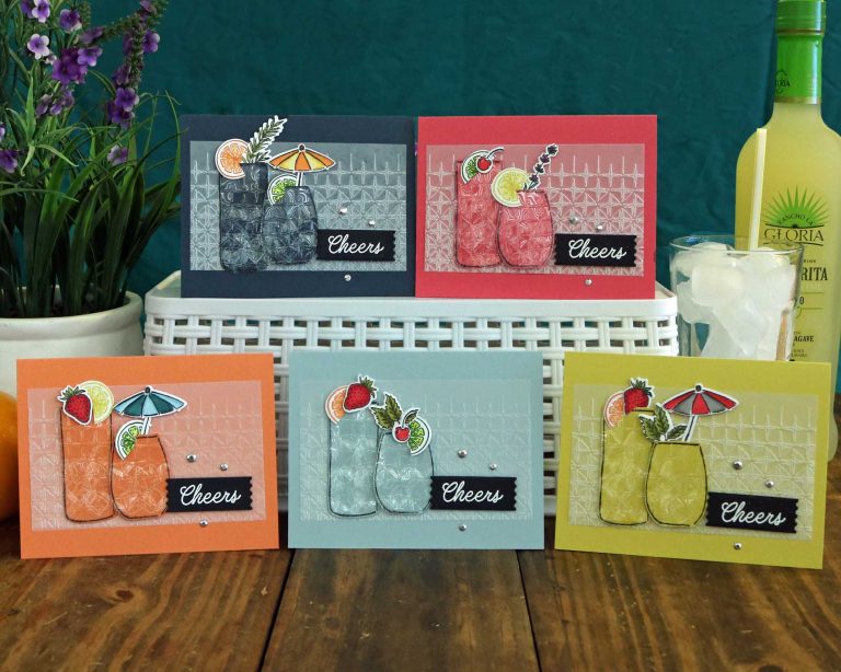 Five matching greeting cards in various colors and the sentiment, "Cheers!"