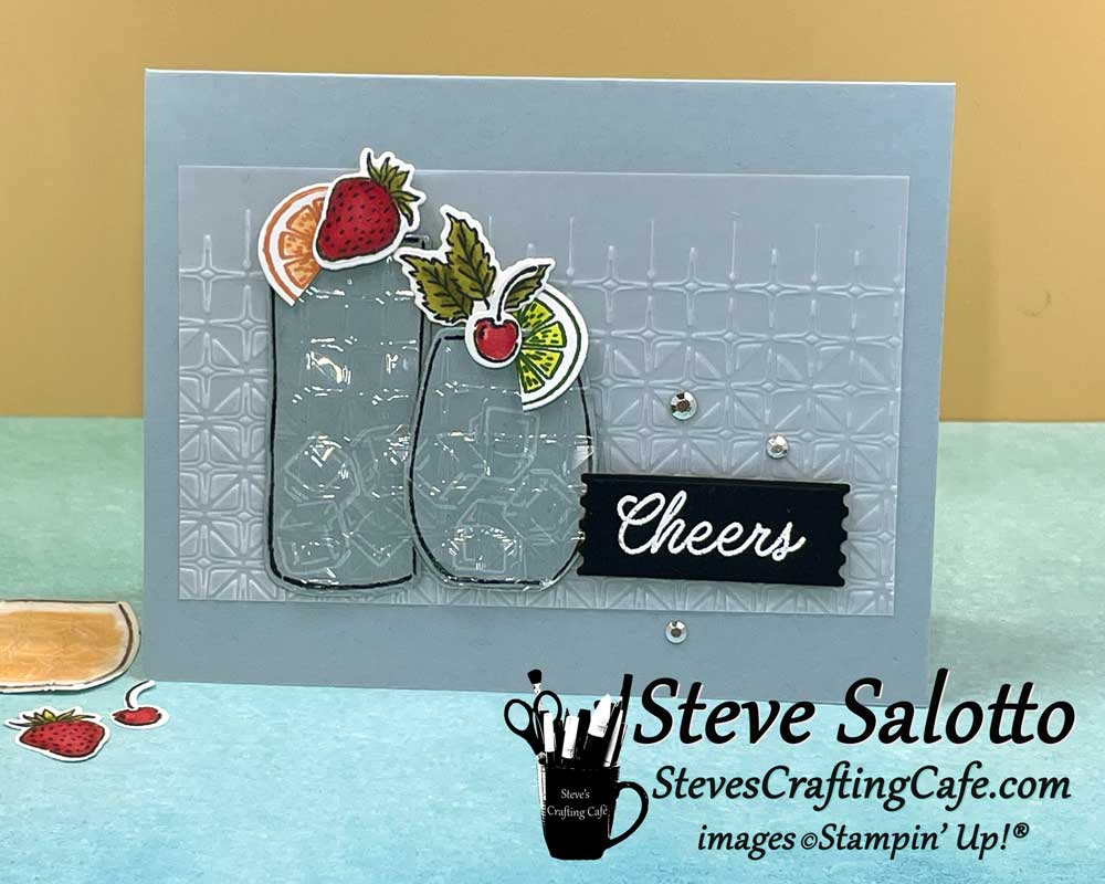 A gray card with two cocktails on it and the sentiment, "Cheers"