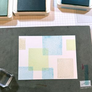 White card stock with several multi-colored rectangles on it.