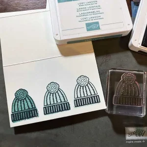 Line art has been added to the three beanies