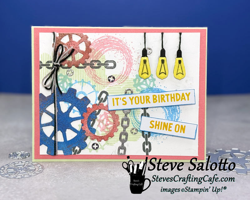 A multi-colored card with gears and light bulbs and the sentiment "It's Your Birthday. Shine On."