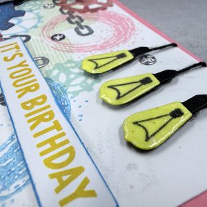 Close up on a card featuring three lightbulbs.