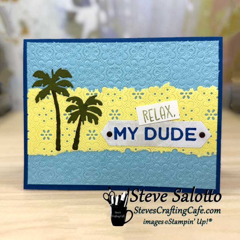 A blue and yellow card with palm trees on it and the sentiment, "Relax my Dude."