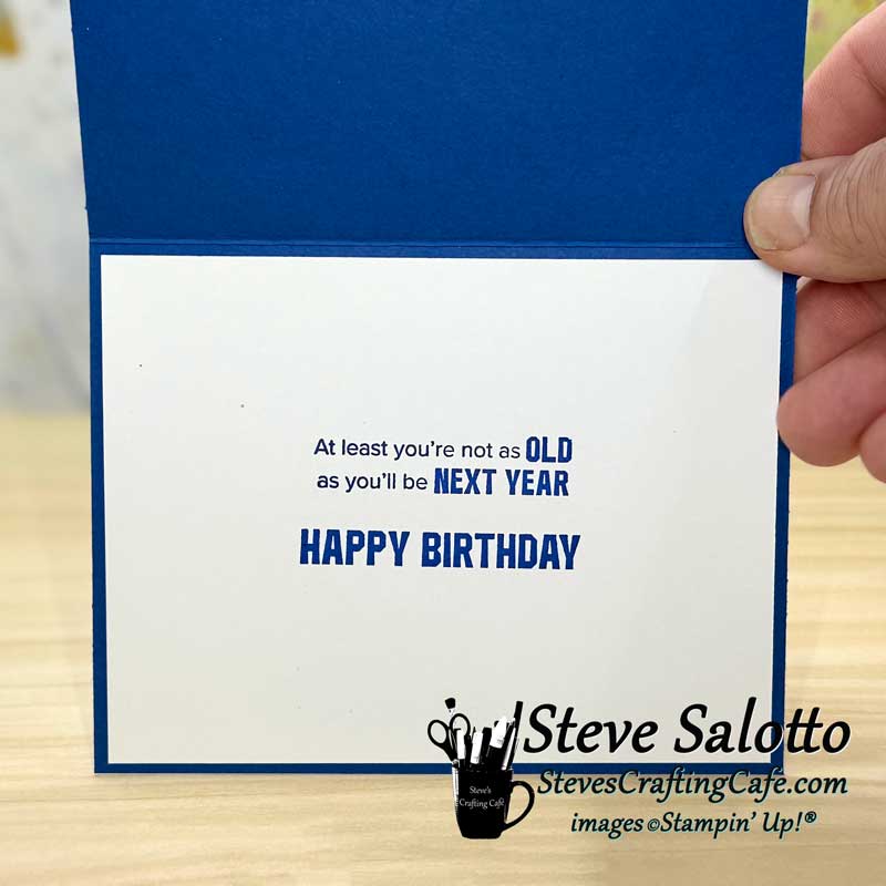Fingers hold the card open. It reads, "at least you're not as old as you'll be next year. Happy Birthday."