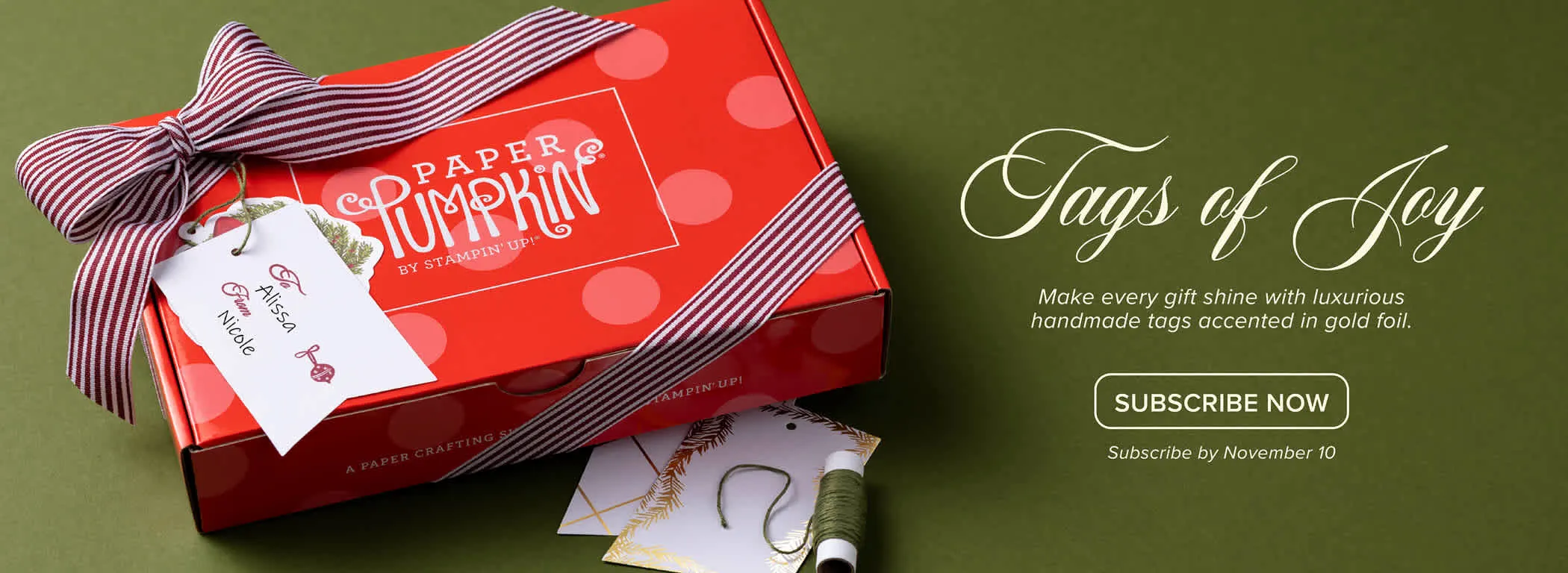 A box with a ribbon around it and the words Paper Pumpkin on it sits next to text reading, "Tags of Joy. Subscribe now."